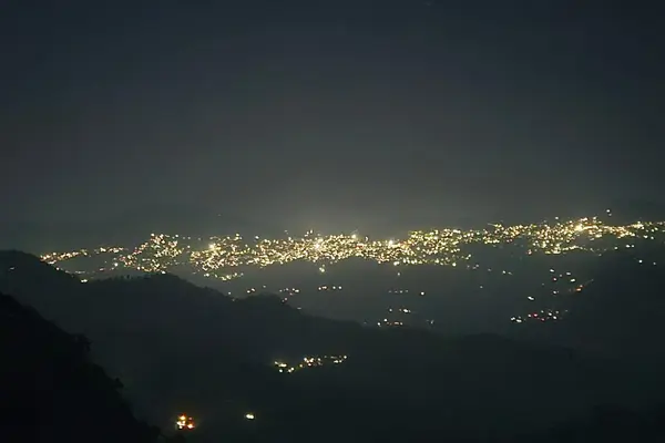 "Illuminated Mountain Village at Night - Himalayas"