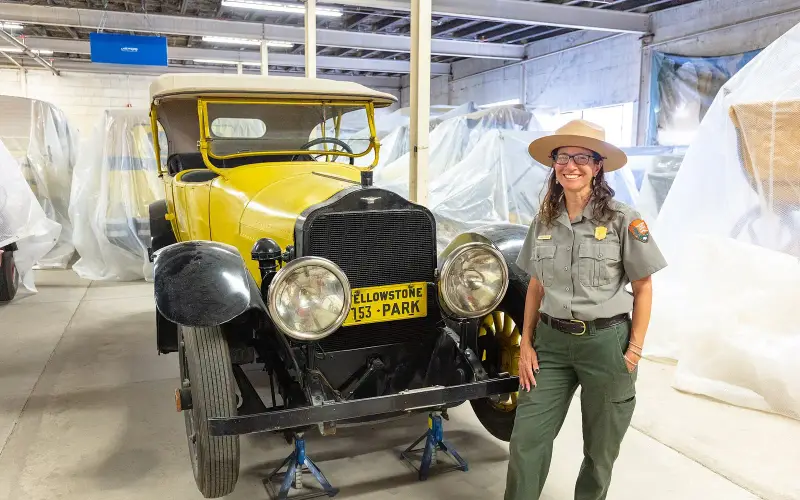 Miriam Watson, Museum Curator, with historic vehicle collection